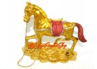 Bejeweled Golden Horse on Bed of Coins